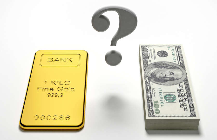 Fed's Hawkish Stance Weighs on Gold Amid Rising Oil Prices