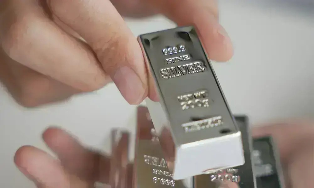 Silver Corrects, Dollar Strengthens